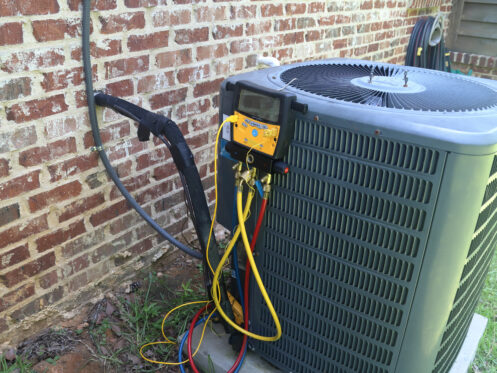 An AC system in Coachella getting maintenance