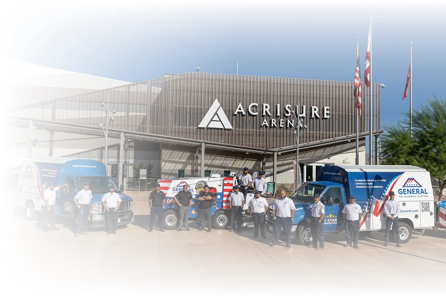 Service team standing in front of branded trucks outside Acrisure Arena.